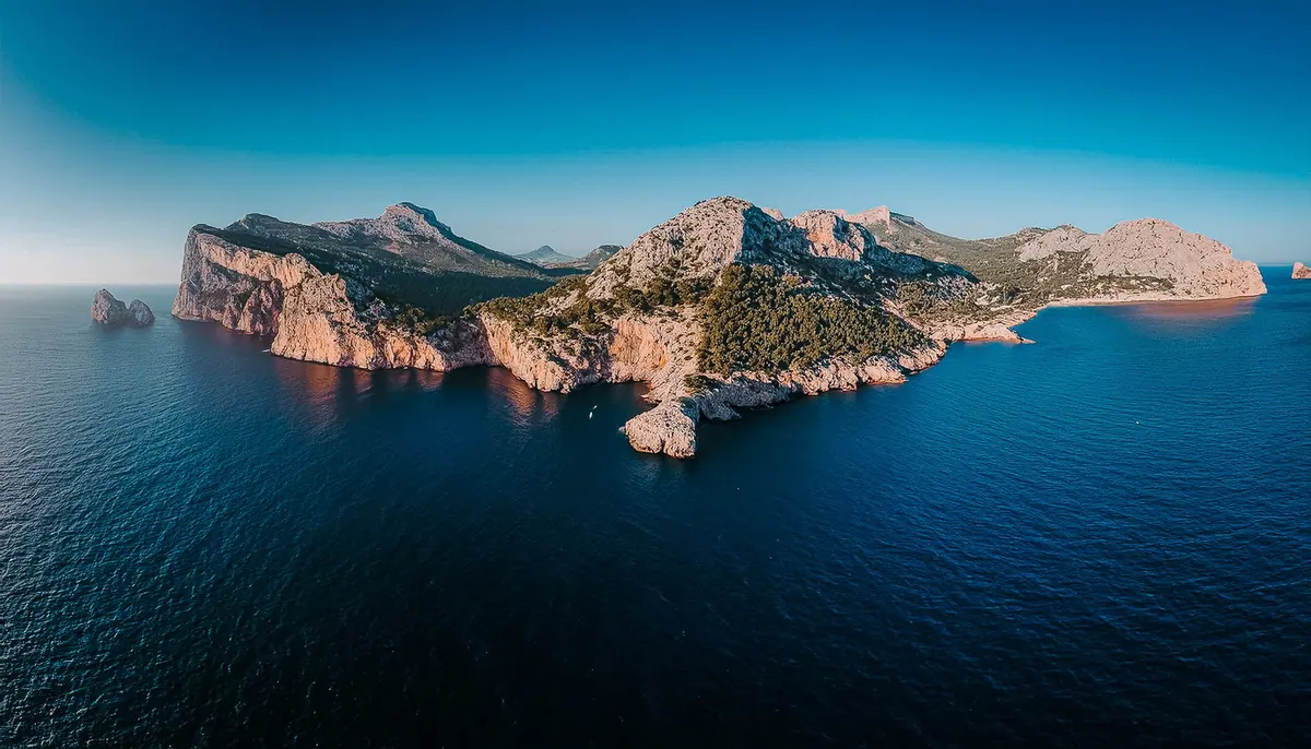 Aerial view of Serra de Tramuntana cliffs rising from the sea